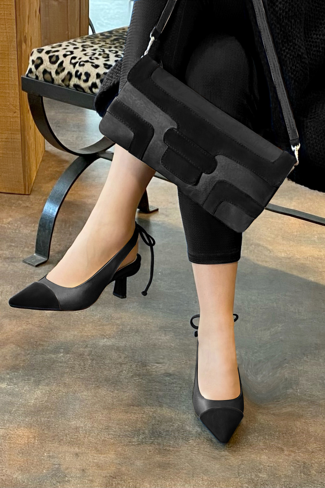 Matt black women's slingback shoes. Pointed toe. Medium spool heels. Worn view - Florence KOOIJMAN